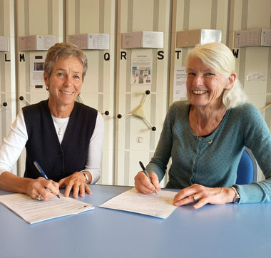 Juliet Vickery and Ruth Briggs signing the Atlas Agreement